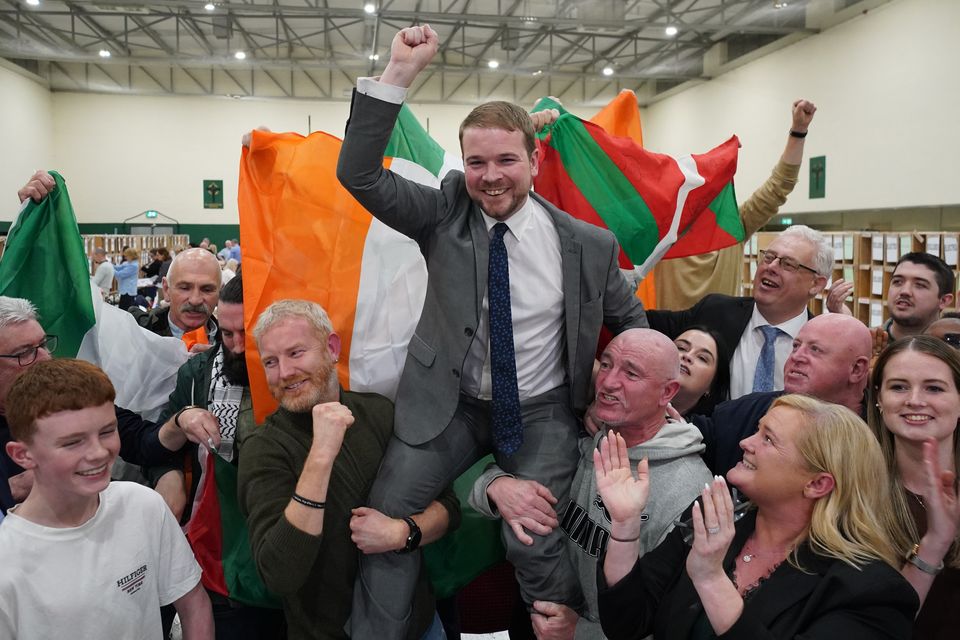 Sinn Fein’s Donnchadh O Laoghaire celebrates being elected for Cork South-Central – one of 39 seats secured by the party (PA)