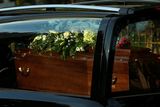 thumbnail: BRIZE NORTON, ENGLAND - JULY 01:  A close-up view of a coffin as a funeral cortege carrying the victims of last Friday's terrorist attack in Tunisia drives through the village of Brize Norton after arriving at the nearby RAF airbase on July 1, 2015 in Brize Norton, England. British nationals Adrian Evans, Charles Evans, Joel Richards, Carly Lovett, Stephen Mellor, John Stollery and Denis and Elaine Thwaites are the first of the victims of last week's terror attack to be repatriated.  (Photo by Dan Kitwood/Getty Images)