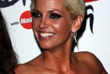 thumbnail: LONDON - FEBRUARY 18:  Sarah Harding of Girls Aloud poses after winning the Best British Single backstage at the Brit Awards 2009 at Earls Court on February 18, 2009 in London, England.  (Photo by Tim Whitby/Getty Images)