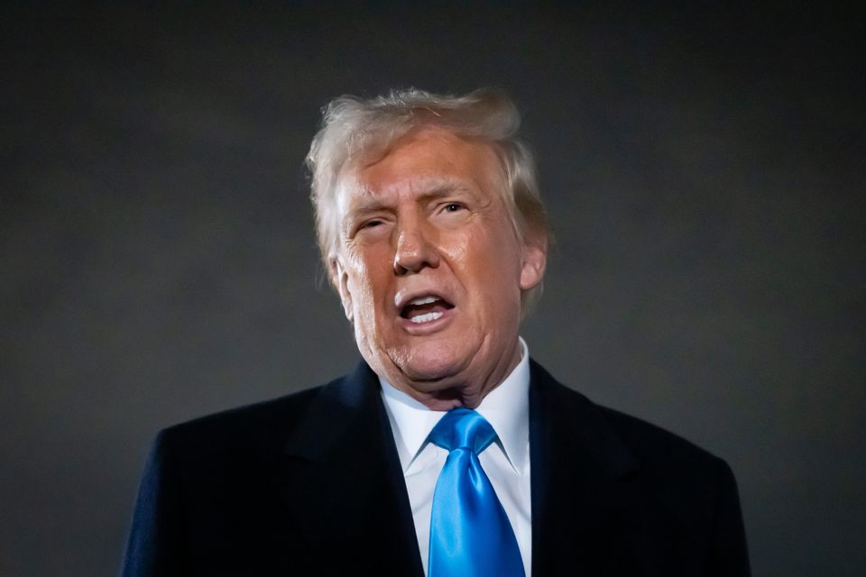 President Donald Trump speaks to reporters next to Air Force One (AP/Ben Curtis)