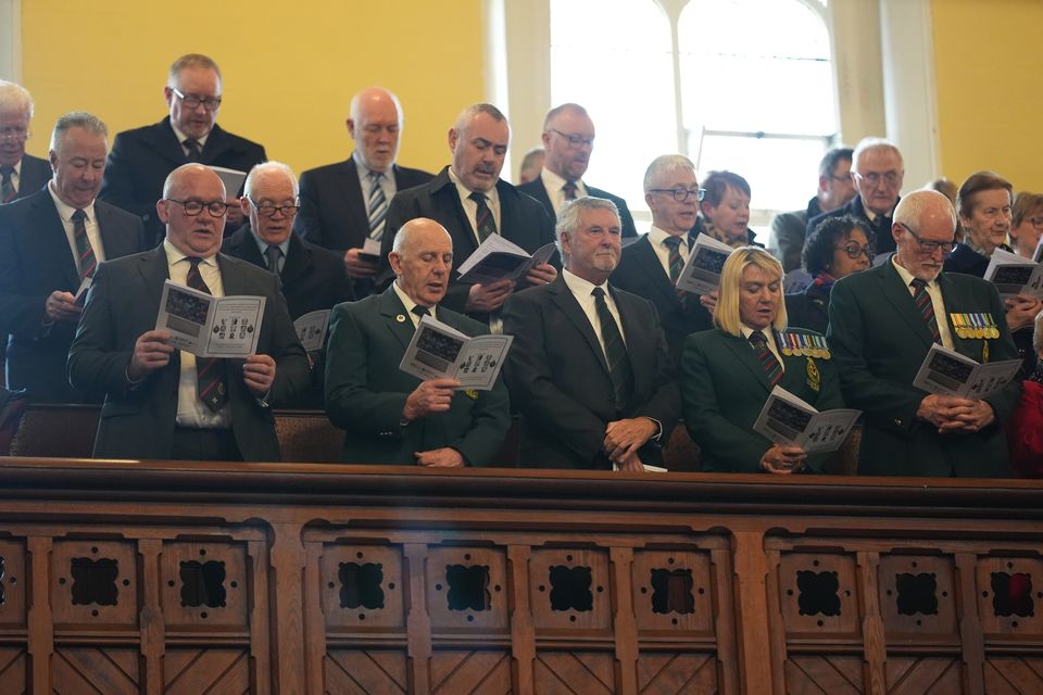 Bereaved families and survivors took part in the event (Niall Carson/PA)