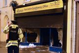thumbnail: Alliance party office which was set on fire in Carrickfergus after a flag protest