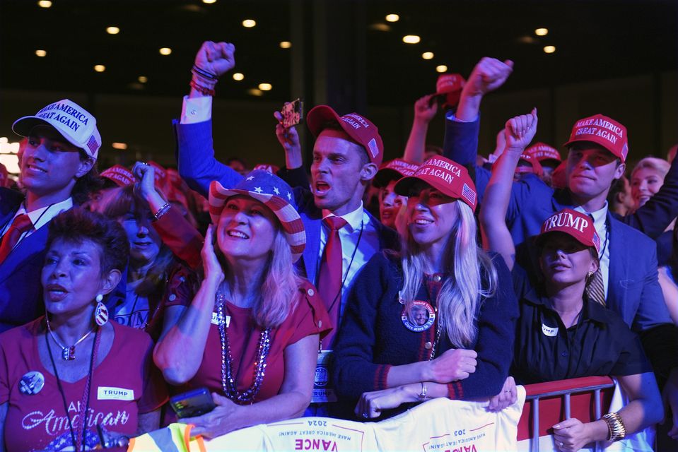 Supporters await an appearance from Donald Trump at an election party in West Palm Beach, Florida (JEvan Vucci/AP)