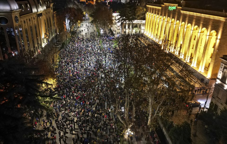 Protesters poured onto the streets of Tbilisi following the announcement (Zurab Tsertsvadze/AP)