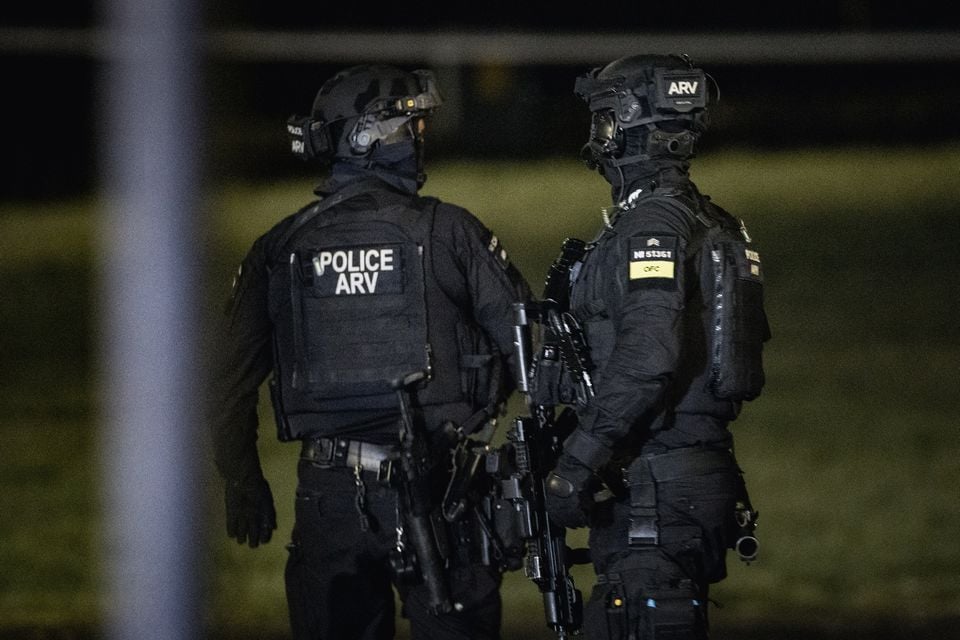 PSNI officers near the scene of the suspected murder