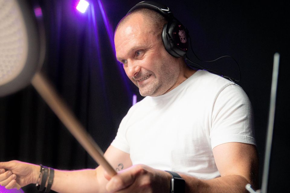 Champion of the world as Lisburn man smashes drumming record