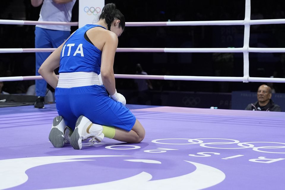 Italy’s Angela Carini pictured in floods of tears after the match (John Locher/AP)