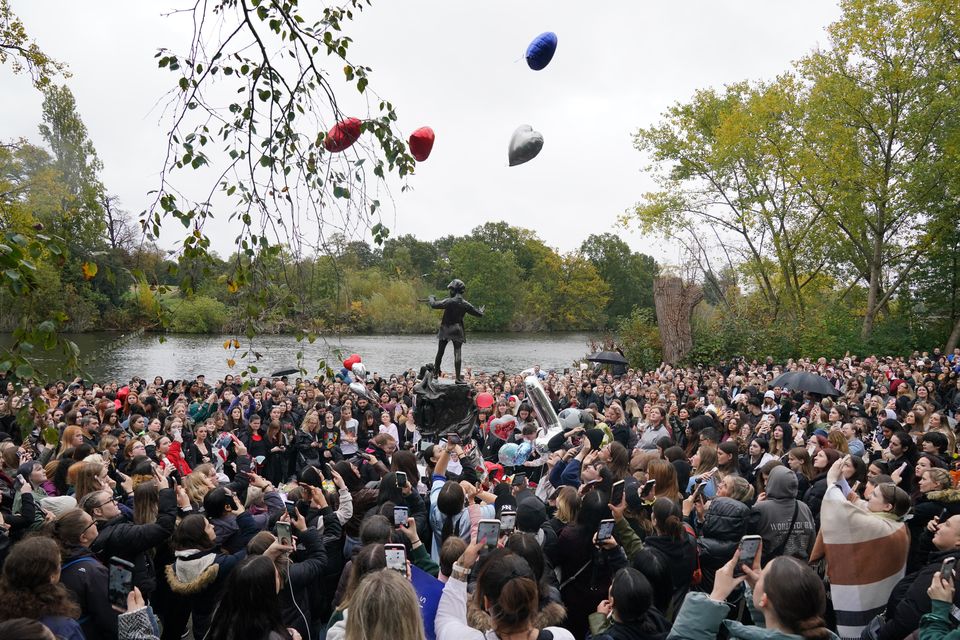 People release balloons during a vigil for 31-year-old One Direction singer Liam Payne, from Wolverhampton, at Hyde Park in central London (Jonathan Brady/PA)