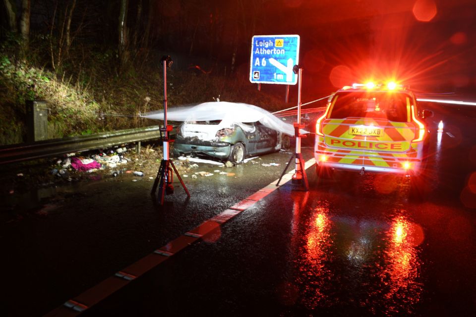 The burnt out Peugeot 206 on the side of the M61 (Met Police/PA_