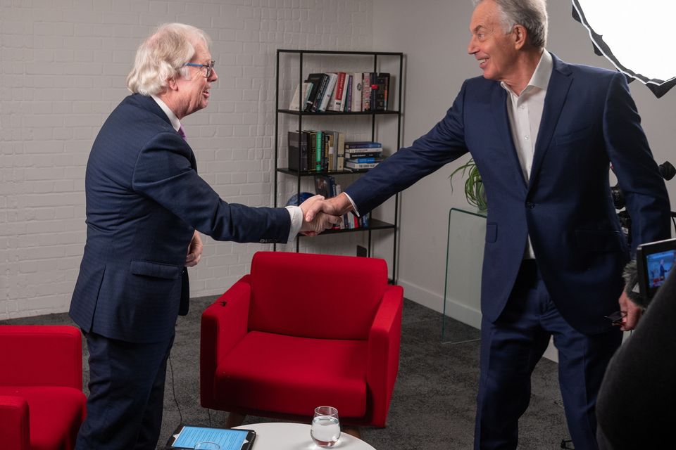 Eamonn Mallie shaking hands with former Prime Minister Tony Blair