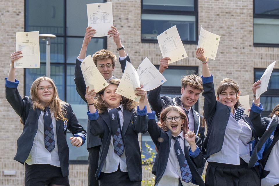 Students at Madras College in St Andrews celebrate their SQA results (Jane Barlow/PA)