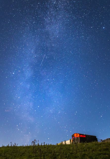 A meteor during a Perseid meteor shower seen from the Yorkshire Dales (Danny Lawson/PA)