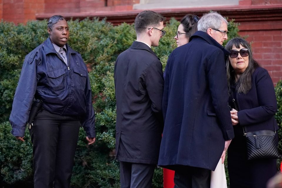 Members of Enoch Burke's family are moved away from the entrance by security as they picket the Ireland funds dinner in Washington DC Niall Carson/PA Wire