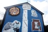 thumbnail: Belfast murals.  A mural off the Newtownards Road dedicated to 'The Lion, The Witch and The Wardrobe' author C.S Lewis who was from the area.  2010.