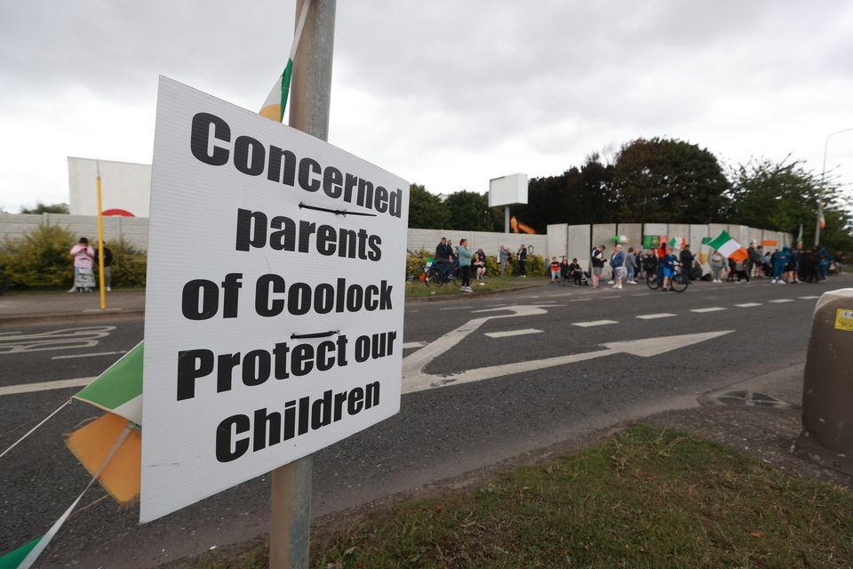 Protesters gather at the former Crown Paints factory in Coolock, north Dublin on Tuesday (Liam McBurney/PA)