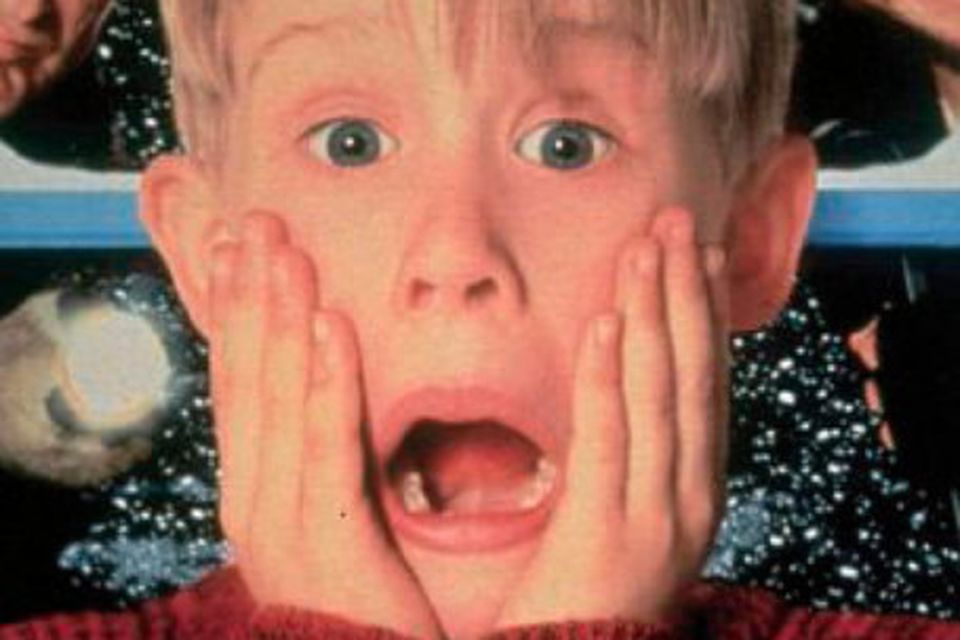 A promotional poster for Home Alone