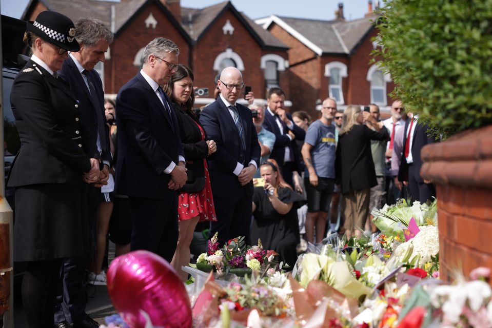 Prime Minister Sir Keir Starmer viewed floral tributes when he visited the scene on Tuesday afternoon (James Speakman/PA)