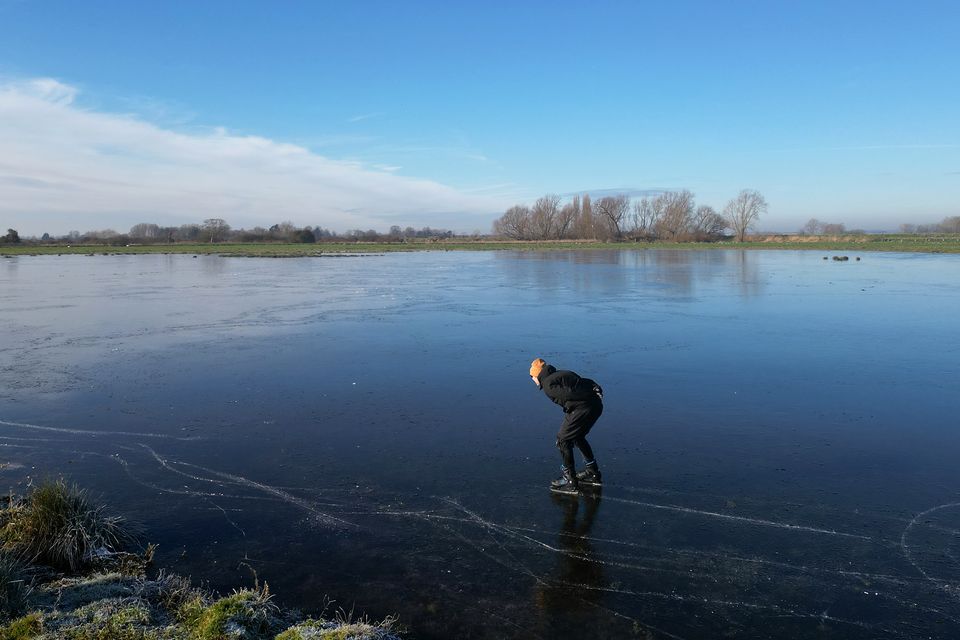 Ugo Sassi skates in the Cambridgeshire Fens (Joe Giddens/ PA)