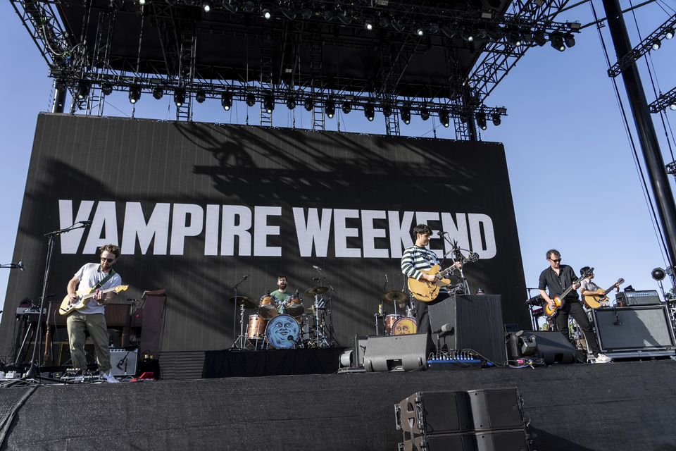 Colin Killalea, left, Chris Tomson, Ezra Koenig, and Chris Baio of Vampire Weekend perform at Coachella (Amy Harris/Invision/AP)