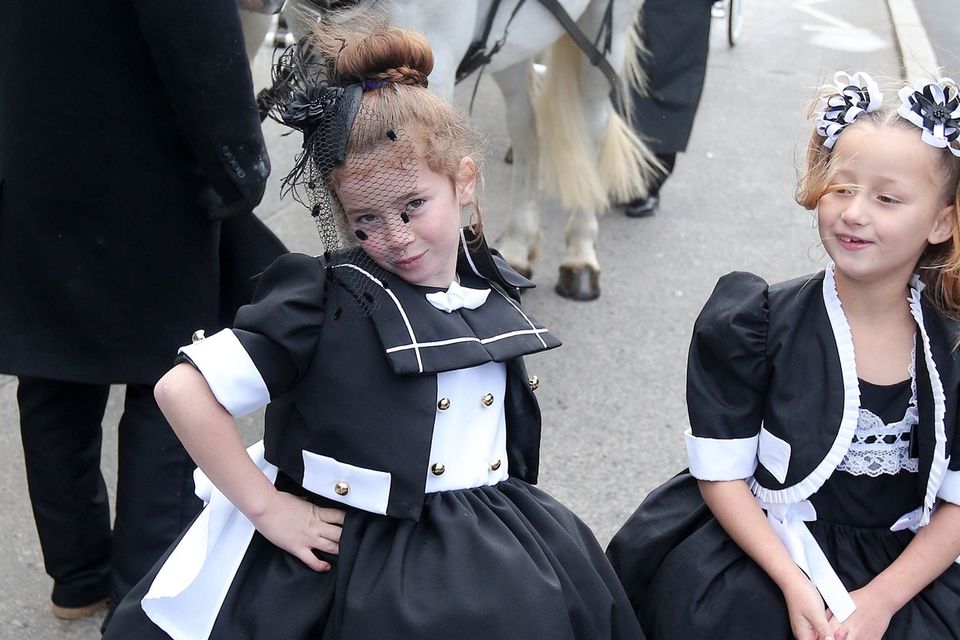 Young mourners pictured outside the church as Requiem Mass is said. Picture by Jonathan Porter/Press Eye