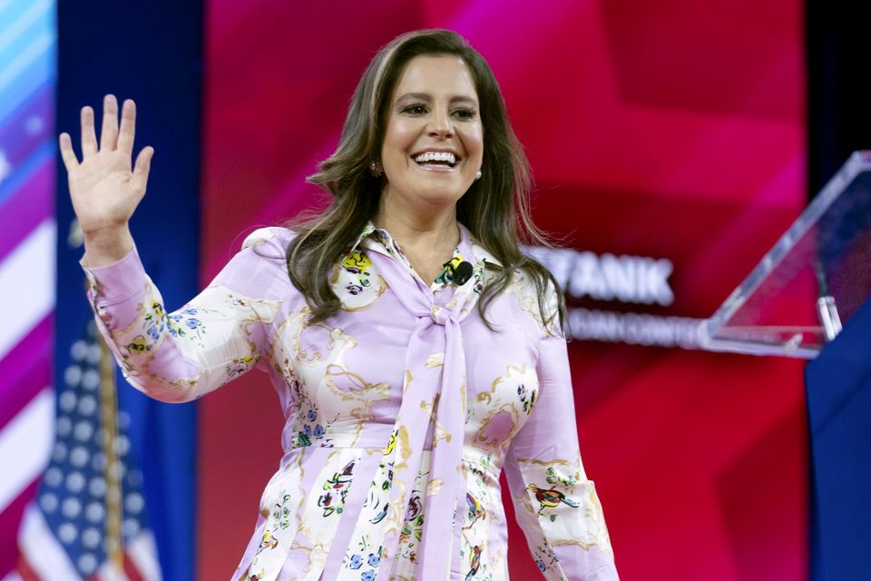 Elise Stefanik waves to supporters at CPAC in Oxon Hill, Maryland (Jose Luis Magana/AP)