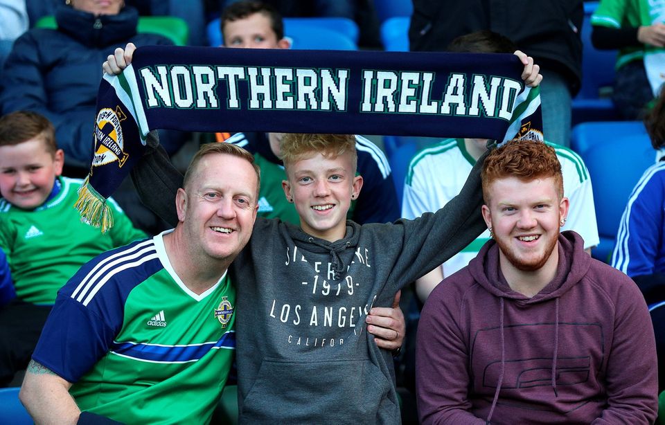 Northern Ireland fans in the stands before the International Friendly at Windsor Park, Belfast. PRESS ASSOCIATION Photo. Picture date: Friday May 27, 2016. See PA story SOCCER N Ireland. Photo credit should read: Niall Carson/PA Wire. RESTRICTIONS: Editorial use only, No commercial use without prior permission, please contact PA Images for further information: Tel: +44 (0) 115 8447447.
