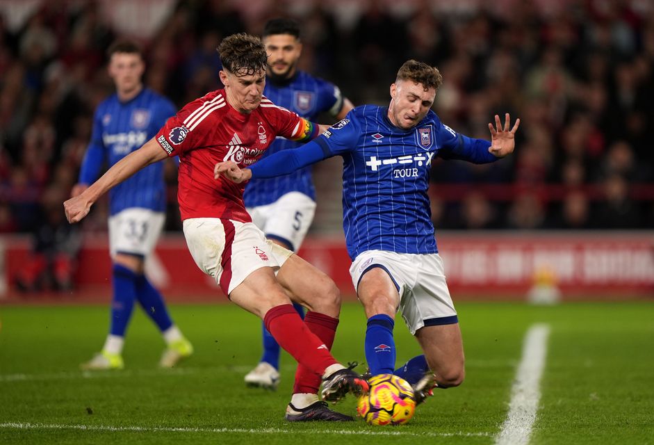 Nottingham Forest’s Ryan Yates, left, was among the Premier League captains to wear a rainbow armband at the weekend (Joe Giddens/PA)