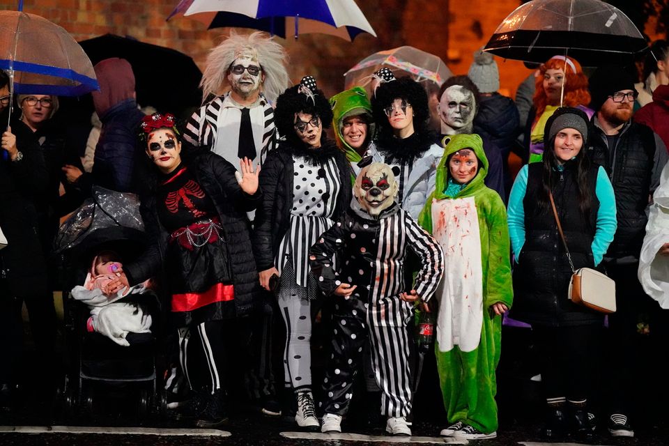 People during the Derry Halloween parade in Londonderry. Picture date: October 31, 2022. Photo credit should read: Niall Carson/PA Wire