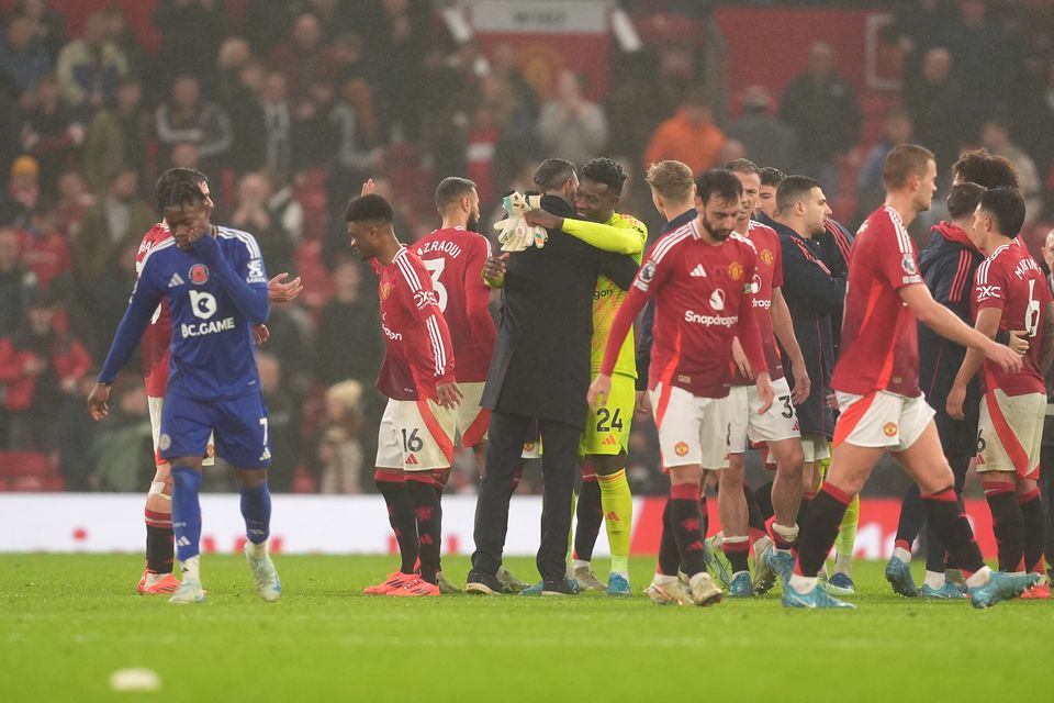 Manchester United interim manager Ruud van Nistelrooy (centre) is waiting to discover his future at the club (Martin Rickett/PA)