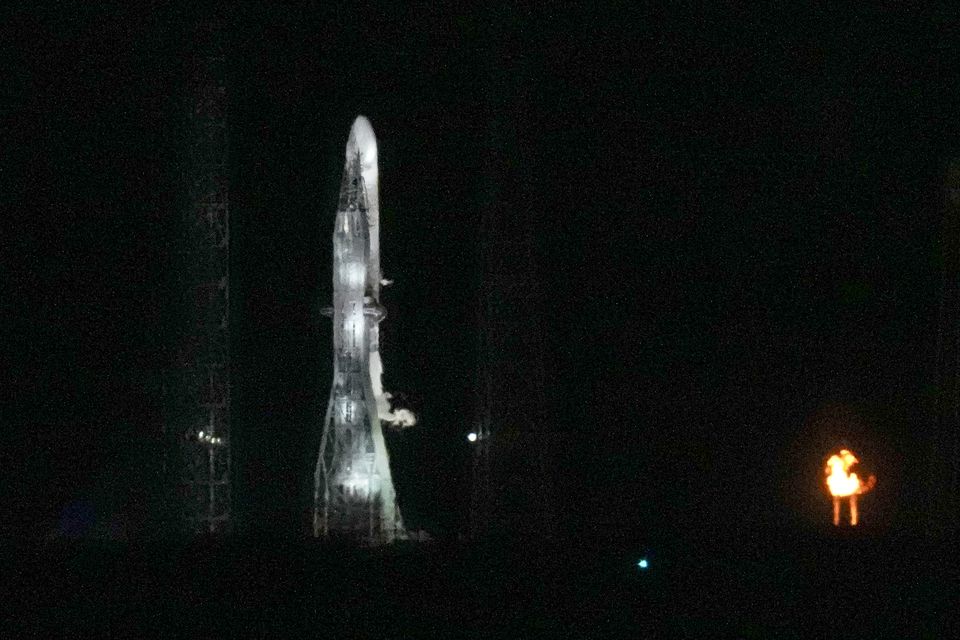 The New Glenn rocket is seen on Launch Complex 36 shortly before the launch attempt was scrapped (John Raoux/AP)