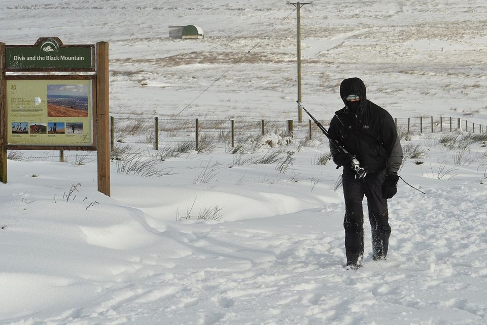 Pacemaker Press 08/12/2017
Battling threw the snow  on Divis Mountain in Co Antrim  , as heavy snow falls across  Northern Ireland on Friday morning, leaving difficult driving conditions for motorists and some schools closed.
Pic Colm Lenaghan/ Pacemaker