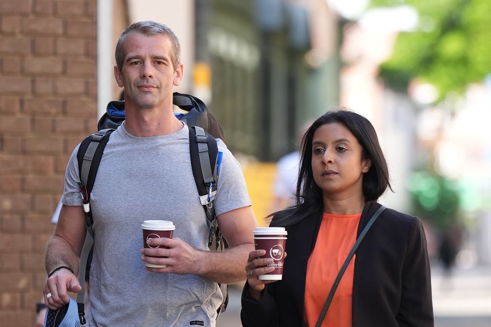 Sean Harper and his wife Shiza Harper outside Chelmsford Crown Court, where they are on trial alongside Mark Christopher and Matthew Martin, charged with conspiracy to kidnap and conspiracy to commit false imprisonment (Joe Giddens/ PA)