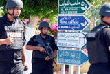 thumbnail: Tunisian security forces man a checkpoint at the entrance of the resort area where is located the Riu Imperial Marhaba Hotel in Port el Kantaoui, on the outskirts of Sousse south of the capital Tunis, on June 27, 2015, in the aftermath of a shooting attack on the beach resort claimed by the Islamic State group. The IS group on June 27 claimed responsibility for the massacre in the seaside resort that killed nearly 40 people, most of them British tourists, in the worst attack in the country's recent history. AFP PHOTO / FETHI BELAIDFETHI BELAID/AFP/Getty Images
