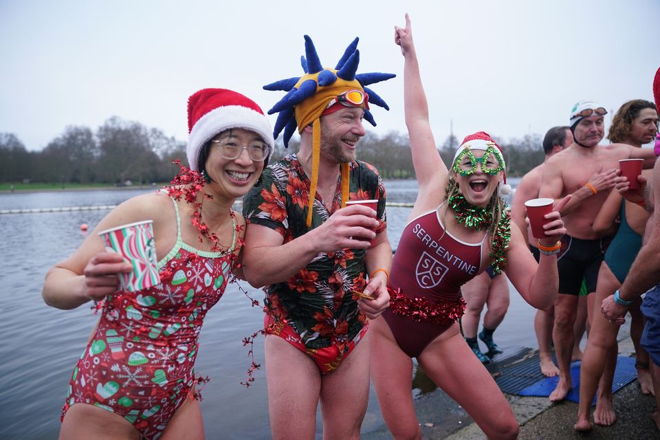 Refreshments were shared by those who had braved the chilly waters of the central London park (Yui Mok/PA)