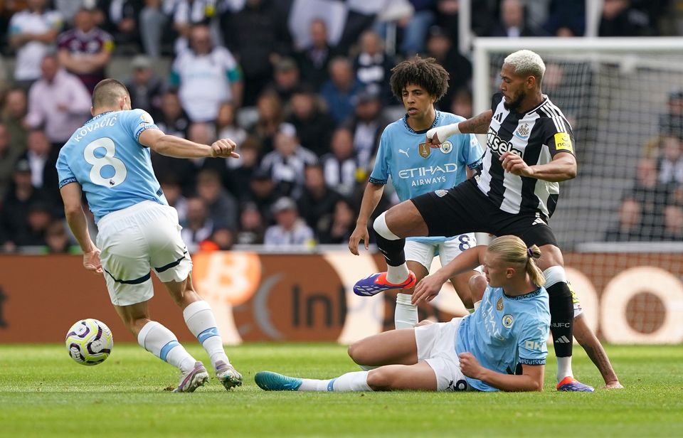 Rico Lewis (centre) is trying to fill the void left by Rodri (Owen Humprheys/PA)