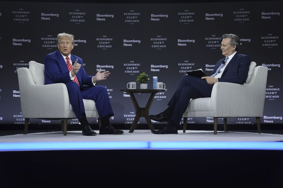 Donald Trump speaks during an interview with Bloomberg News editor-in-chief John Micklethwait during an event with the Economic Club of Chicago on Tuesday (Evan Vucci/AP)