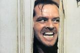 thumbnail: Jack Nicholson peering through axed in door in lobby card for the film 'The Shining', 1980. (Photo by Warner Brothers/Getty Images)