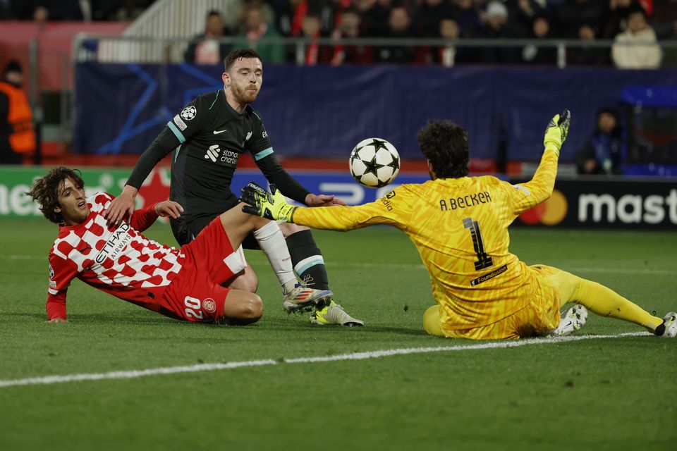 Goalkeeper Alisson Becker kept a clean sheet in his first appearance for two months (Joan Monfort/AP)