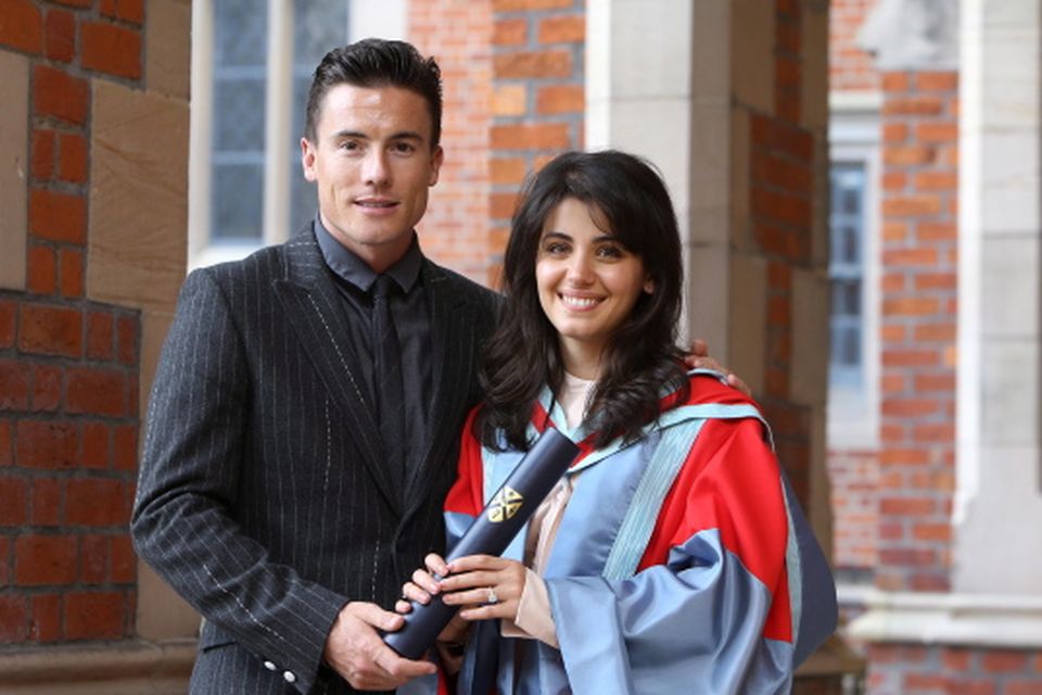 Singer Katie Melua with her husband James Toseland pose for a photograph after Graduation at Queen's University Belfast, Saturday Photo/Paul McErlane