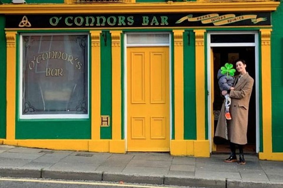 Erin outside O'Connor's bar in Ballycastle