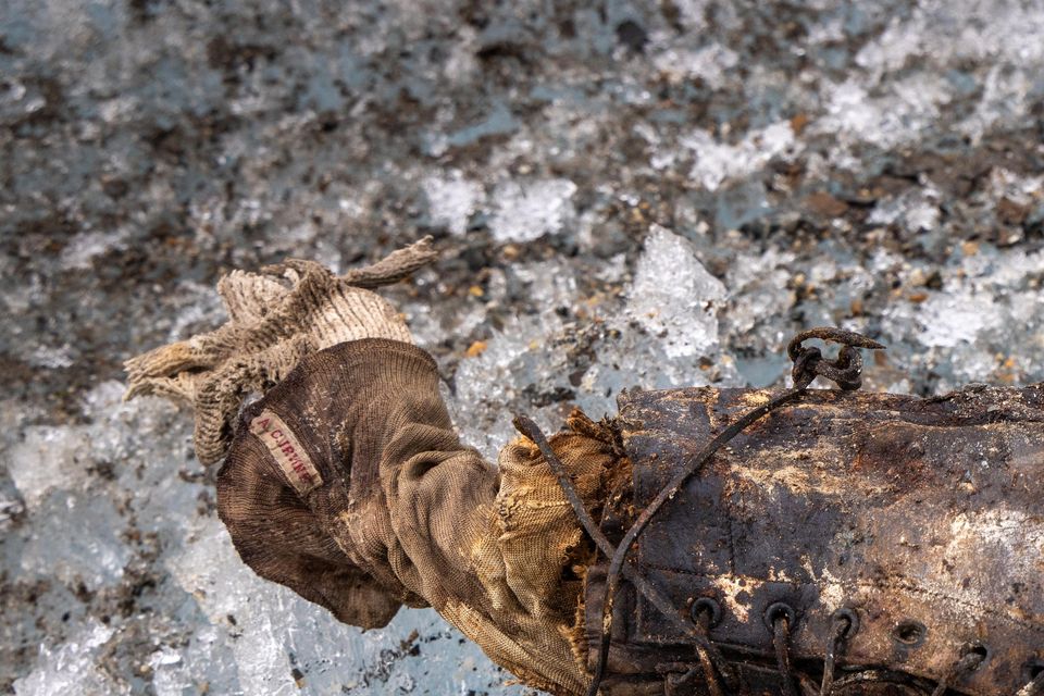 The sock and boot were found by a team working on an upcoming documentary (Jimmy Chin/National Geographic/PA)