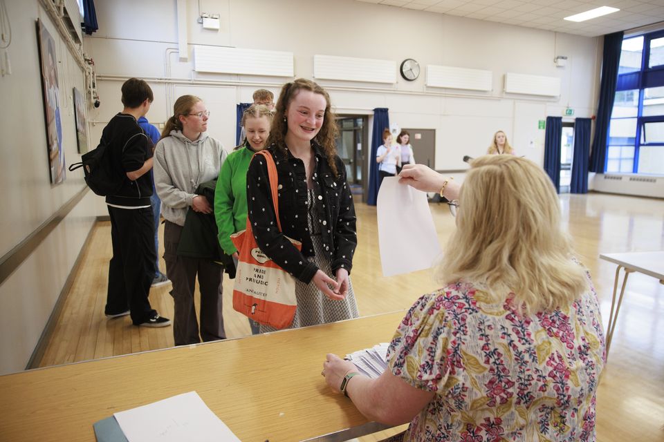 Emma Harris receiving her A-level results at Belfast High School (Liam McBurney/PA)