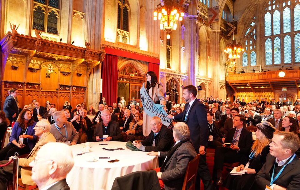 Activists from Climate Resistance protest during Kemi Badenoch’s keynote speech (Ben Whitley/PA)