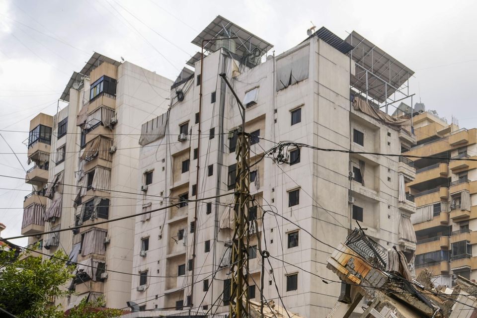 A damaged building at the site of an Israeli airstrike in Beirut (Hassan Ammar/AP)