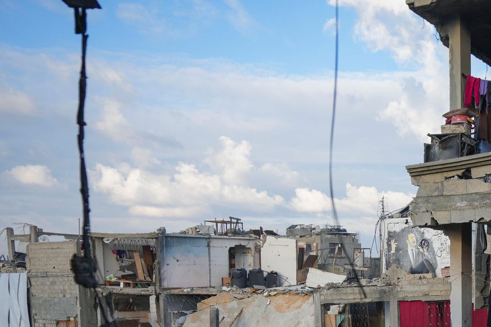 Laundry hangs on a destroyed building in the Gaza Strip (Abdel Kareem Hana/AP)