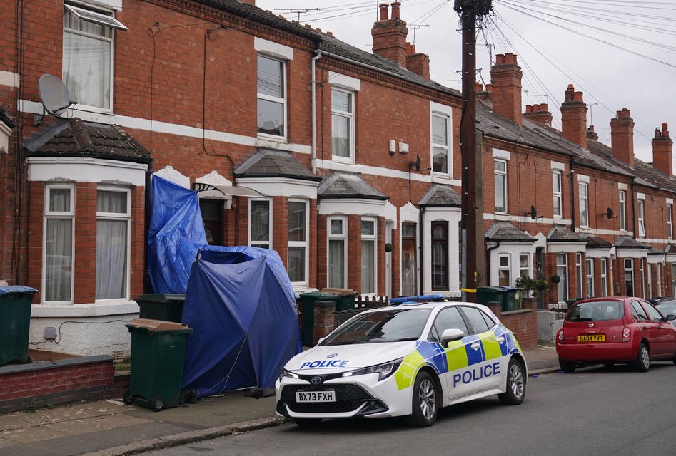 A scene is still in place as forensic examinations and other enquiries are carried out (Jacob King/PA)