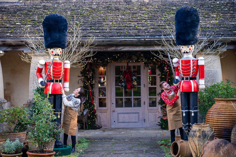 Nutcracker soldiers adorn the entrance (Ben Birchall/PA)