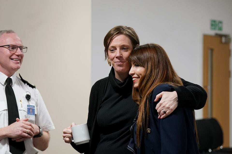 Safeguarding Minister Jess Phillips (centre) and campaigner Nour Norris (right) (PA)