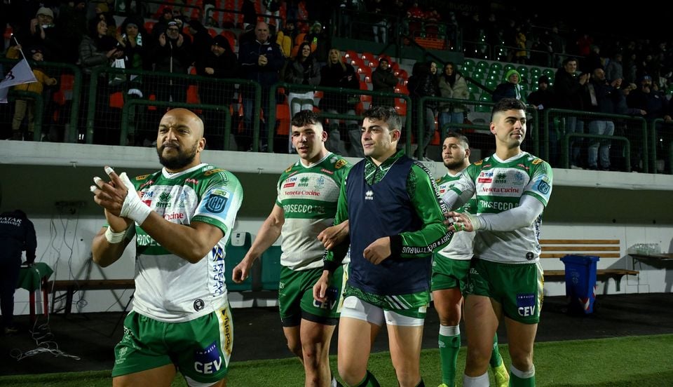 Benetton players celebrate following their United Rugby Championship victory over Ulster in Treviso