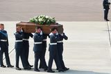 thumbnail: BRIZE NORTON, ENGLAND - JULY 01:  The coffin of Elaine Thwaites, one of the victims of last Friday's terrorist attack, is taken from the RAF C-17 aircraft at RAF Brize Norton in Tunisia, on July 1, 2015 in Brize Norton, England. British nationals Adrian Evans, Charles Evans, Joel Richards, Carly Lovett, Stephen Mellor, John Stollery, and Denis and Elaine Thwaites are the first of the victims of last week's terror attack to be repatriated.  (Photo by Joe Giddens-WPA Pool/Getty Images)